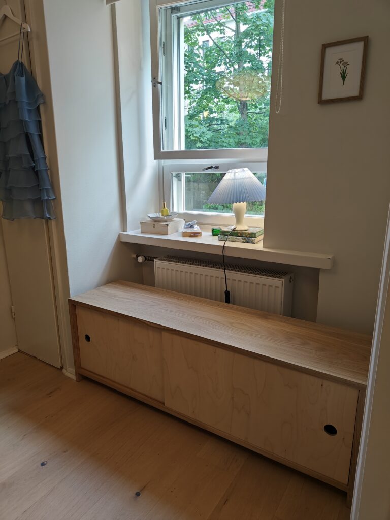 Oak bench & storage in room